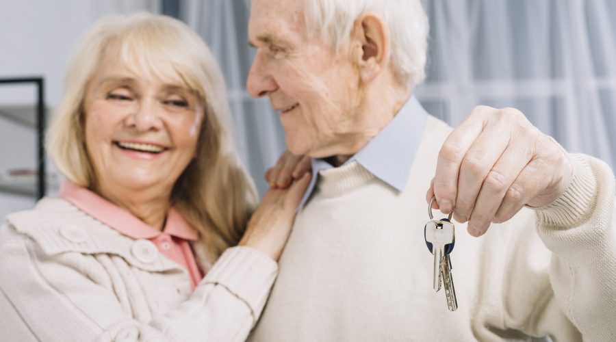 senior couple with keys